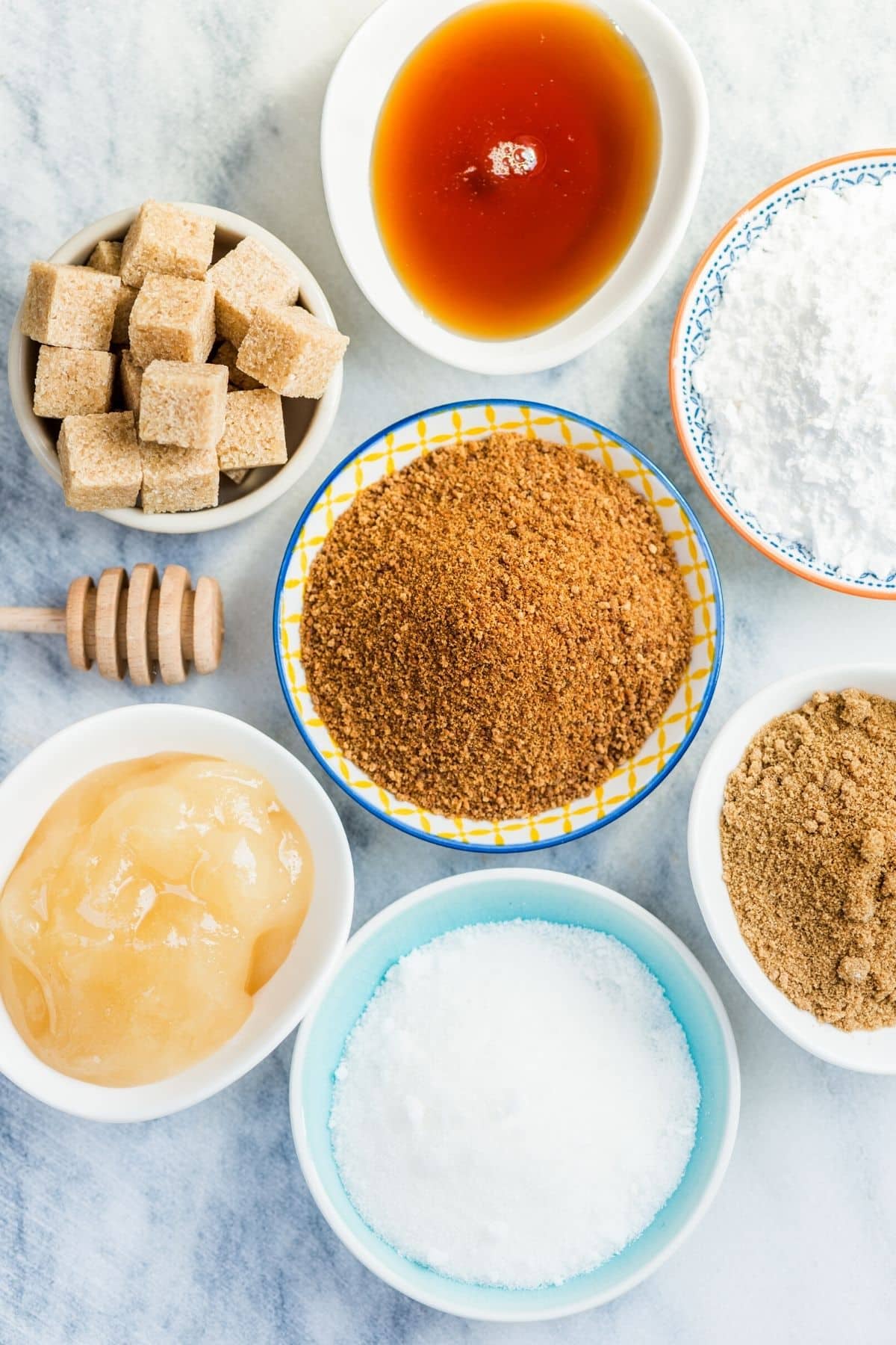 bowls of sugar alternatives on a table.