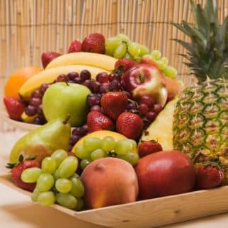 Bowls of fruit on a table.