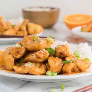 dish of cooked air fryer orange chicken with rice.