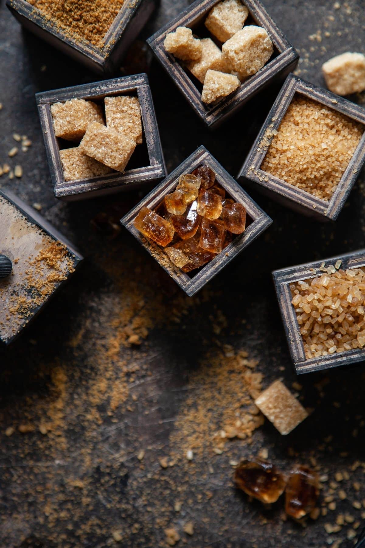 Bowls with different types of sugar in them.