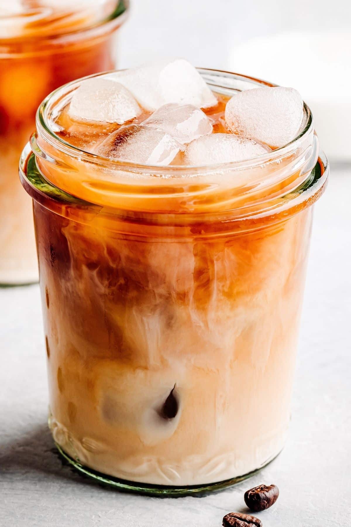 creamy iced coffee served in a pretty glass.