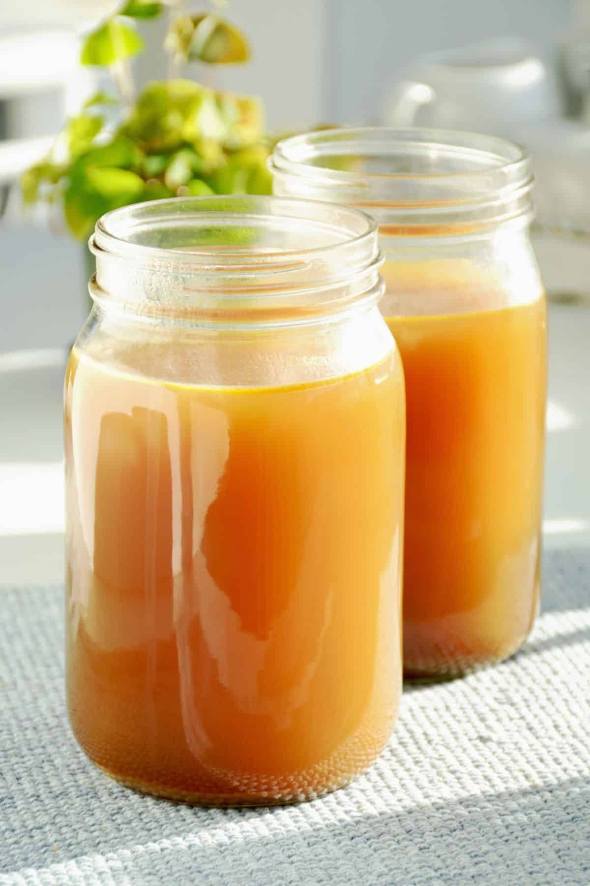 Bone broth in two quart jars.