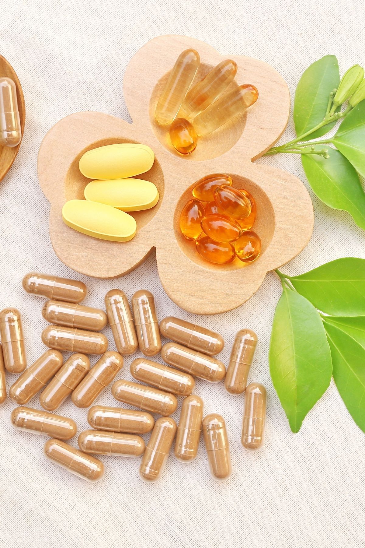 Various probiotic supplements on a wood board.