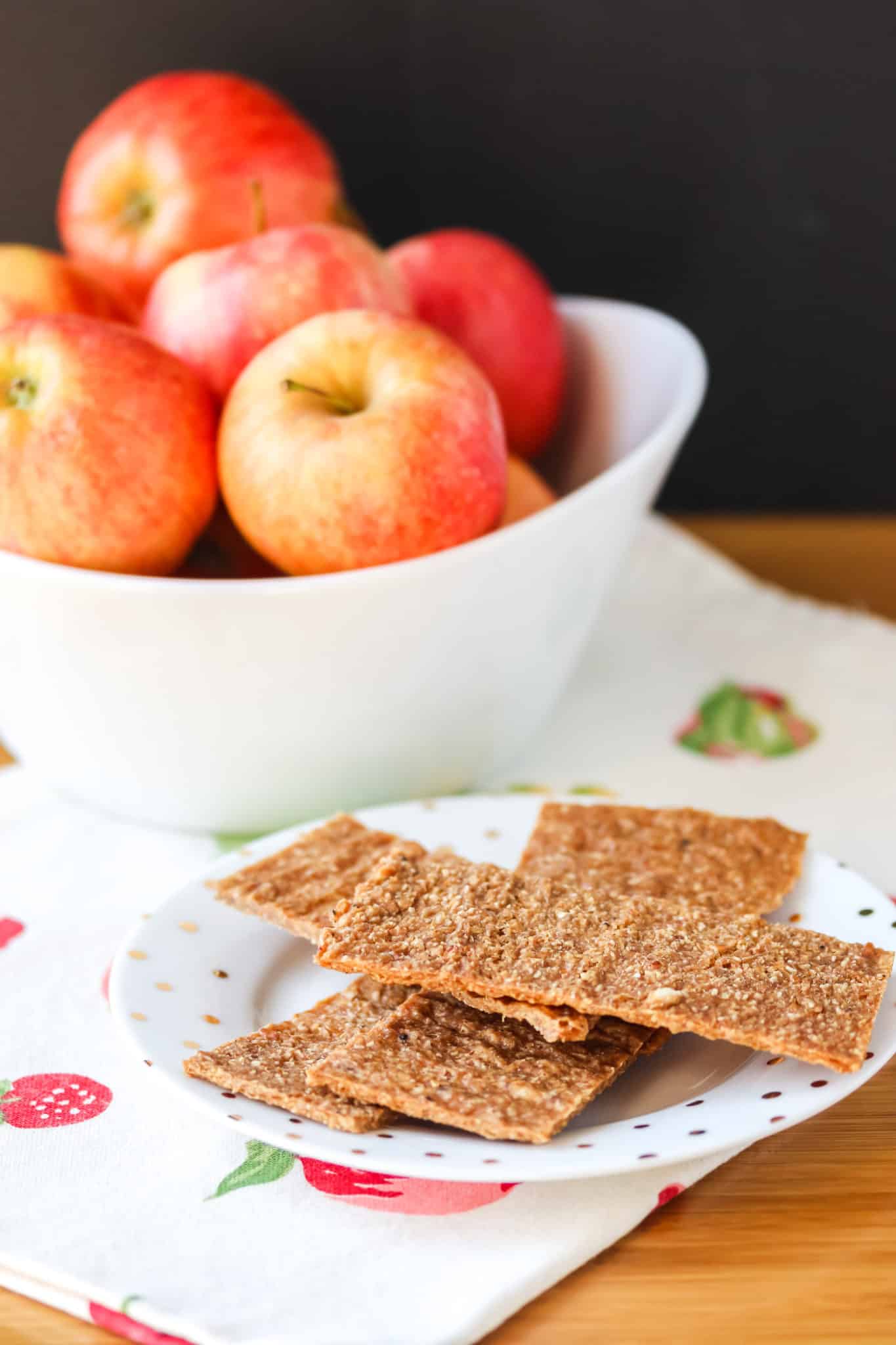 apple flax dehydrator crackers on a plate.