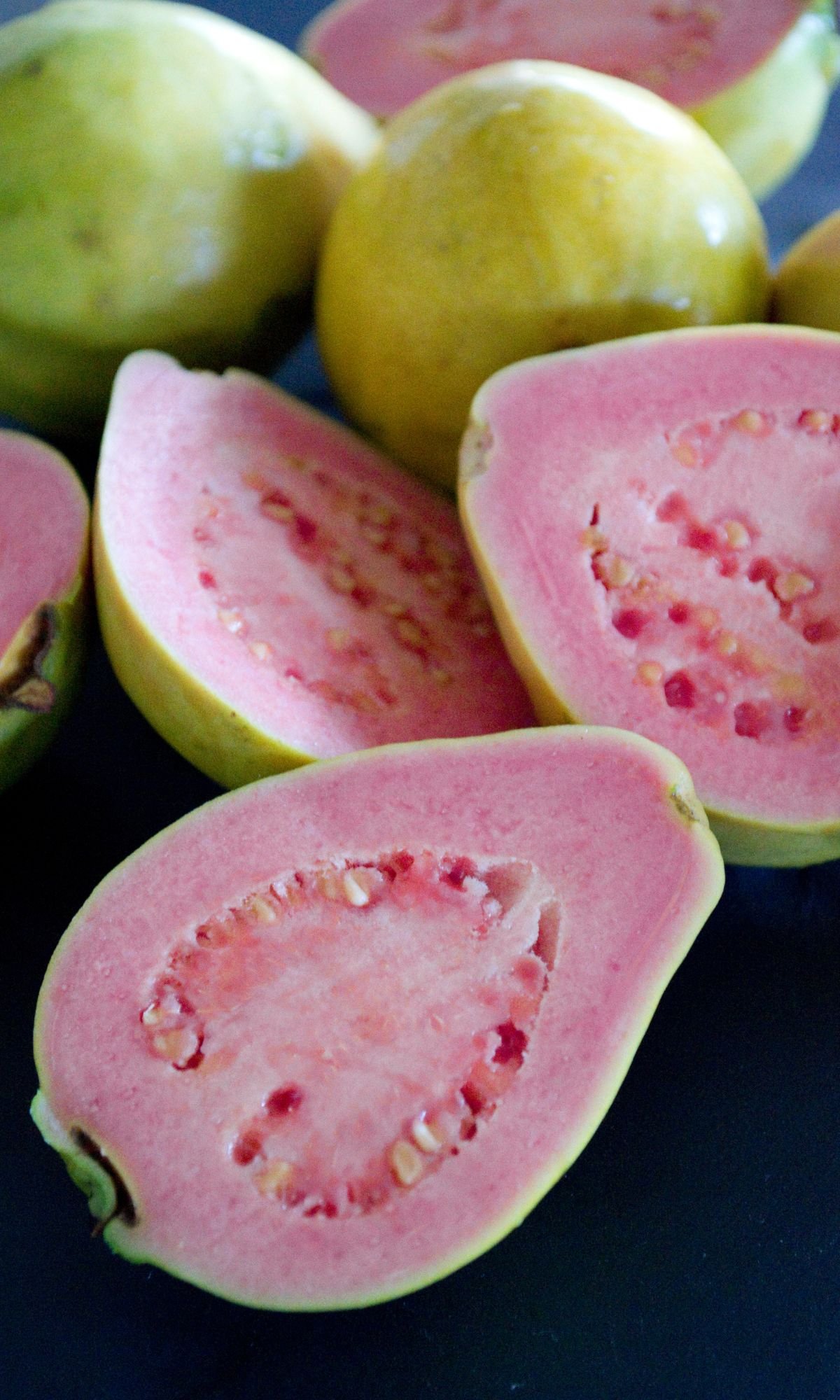 an image of guava fruit, sliced.