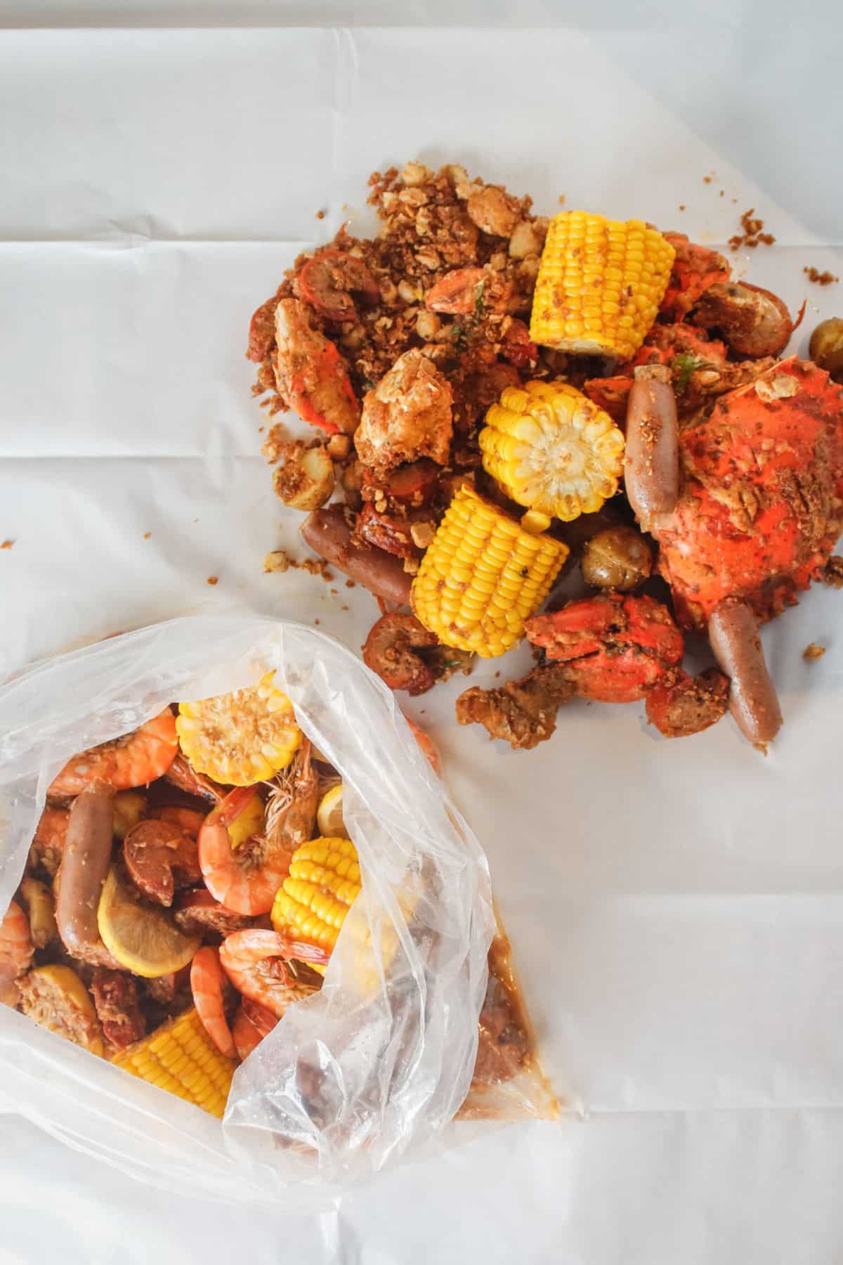 Crab boil with corn, shrimp, and seasonings.