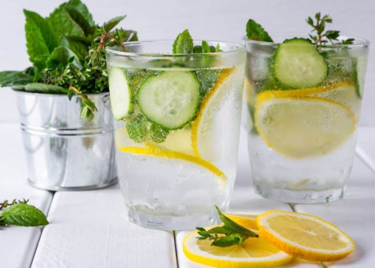 cucumber lemon mint water with lemon slices.