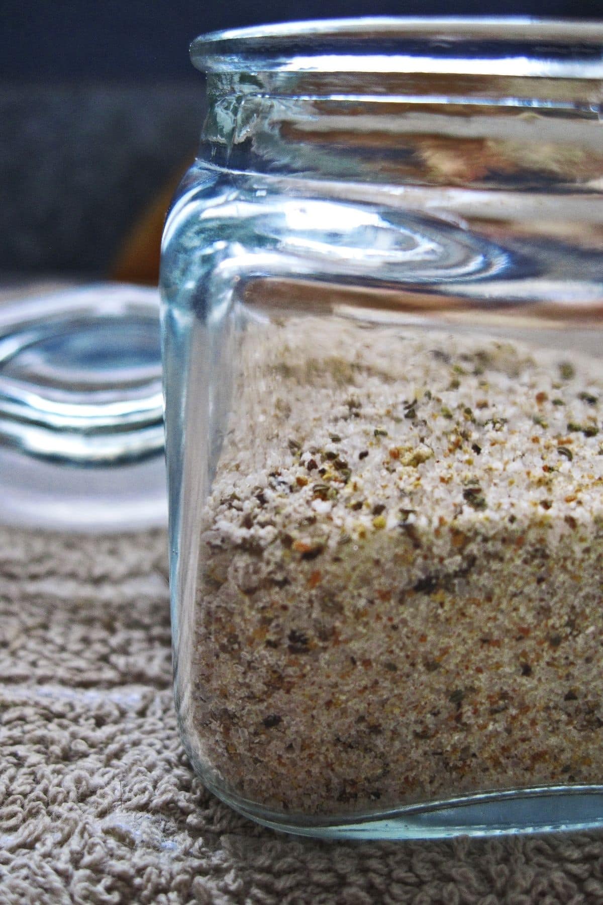 Clear glass container of Seasoning salt.
