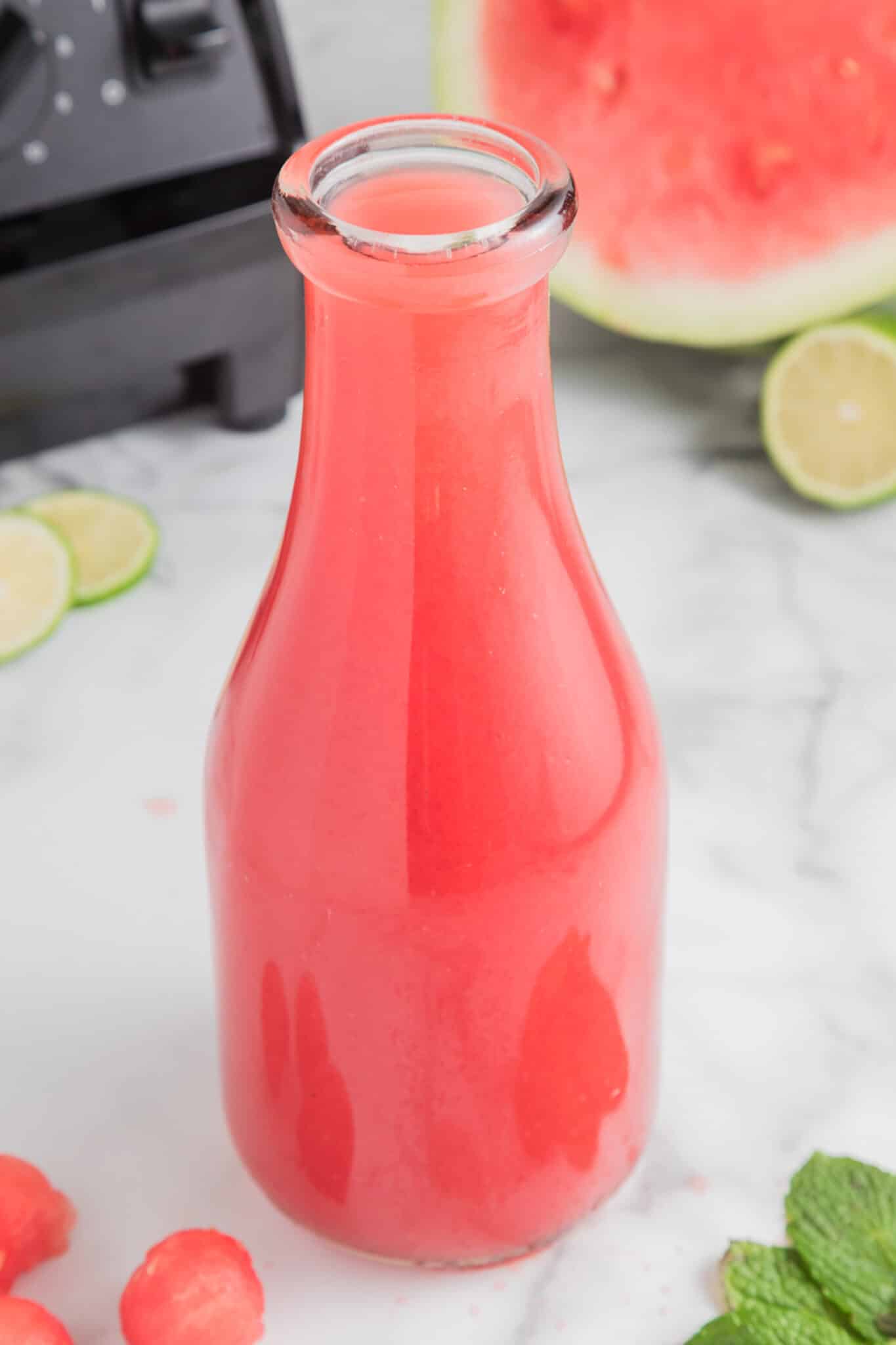 jar with pink watermelon juice.