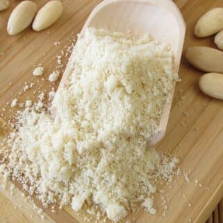 scoop of almond flour with blanched almonds