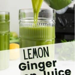 A blender pouring lemon ginger juice into a tall glass.