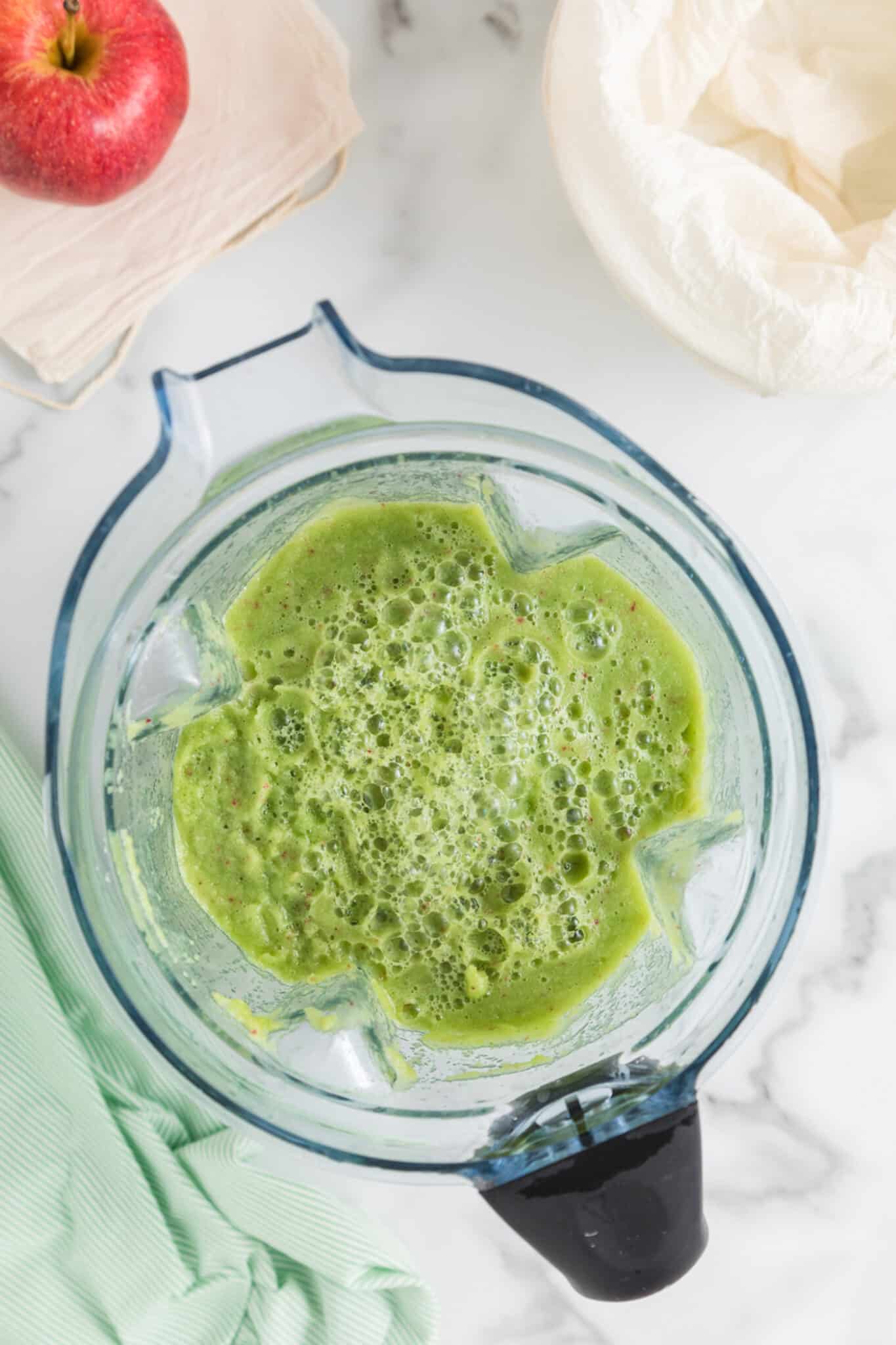 Blended cucumber celery juice in the jar of a high powered blender.