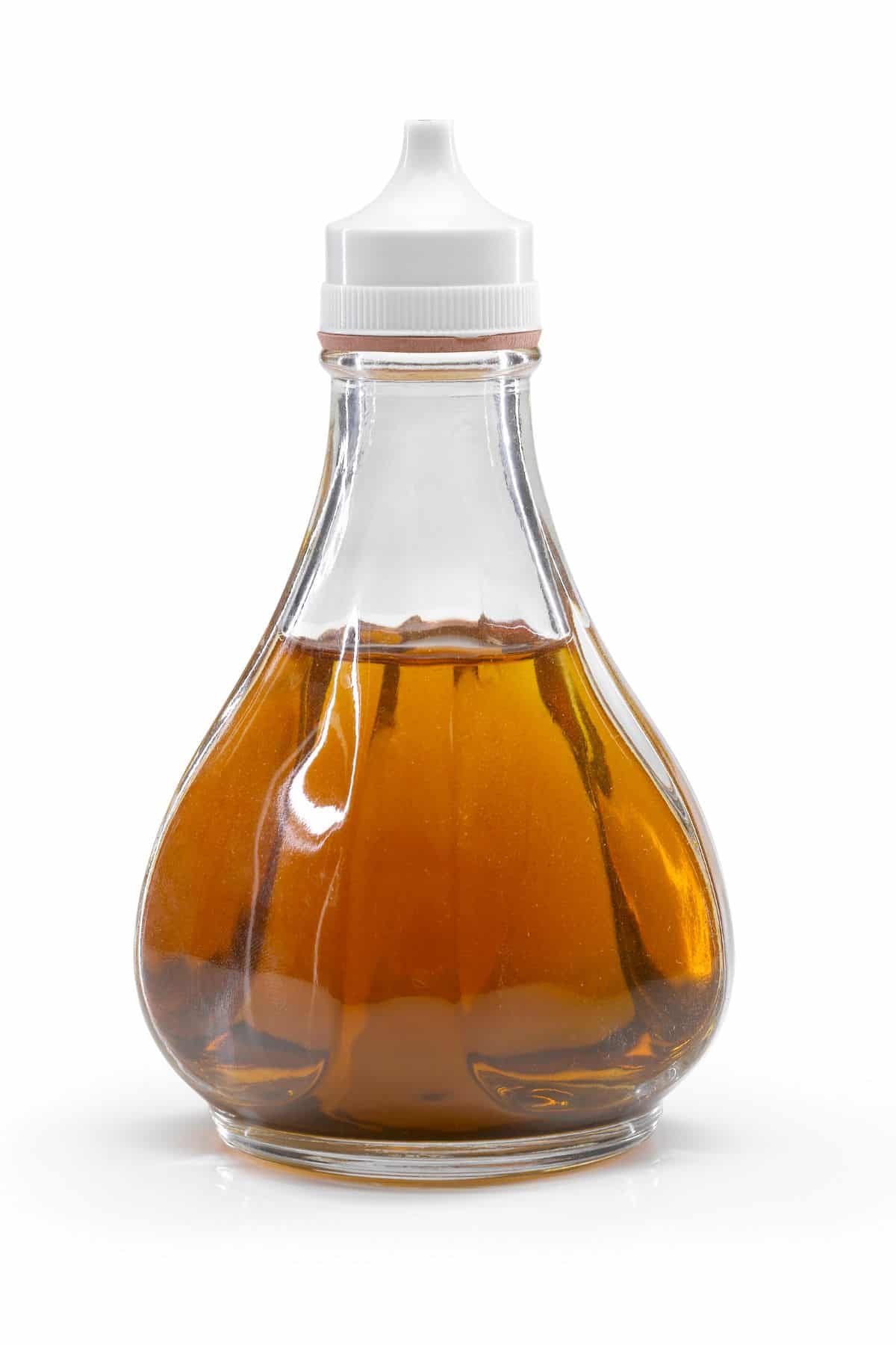 Bottle of Sherry Vinegar with white cap.