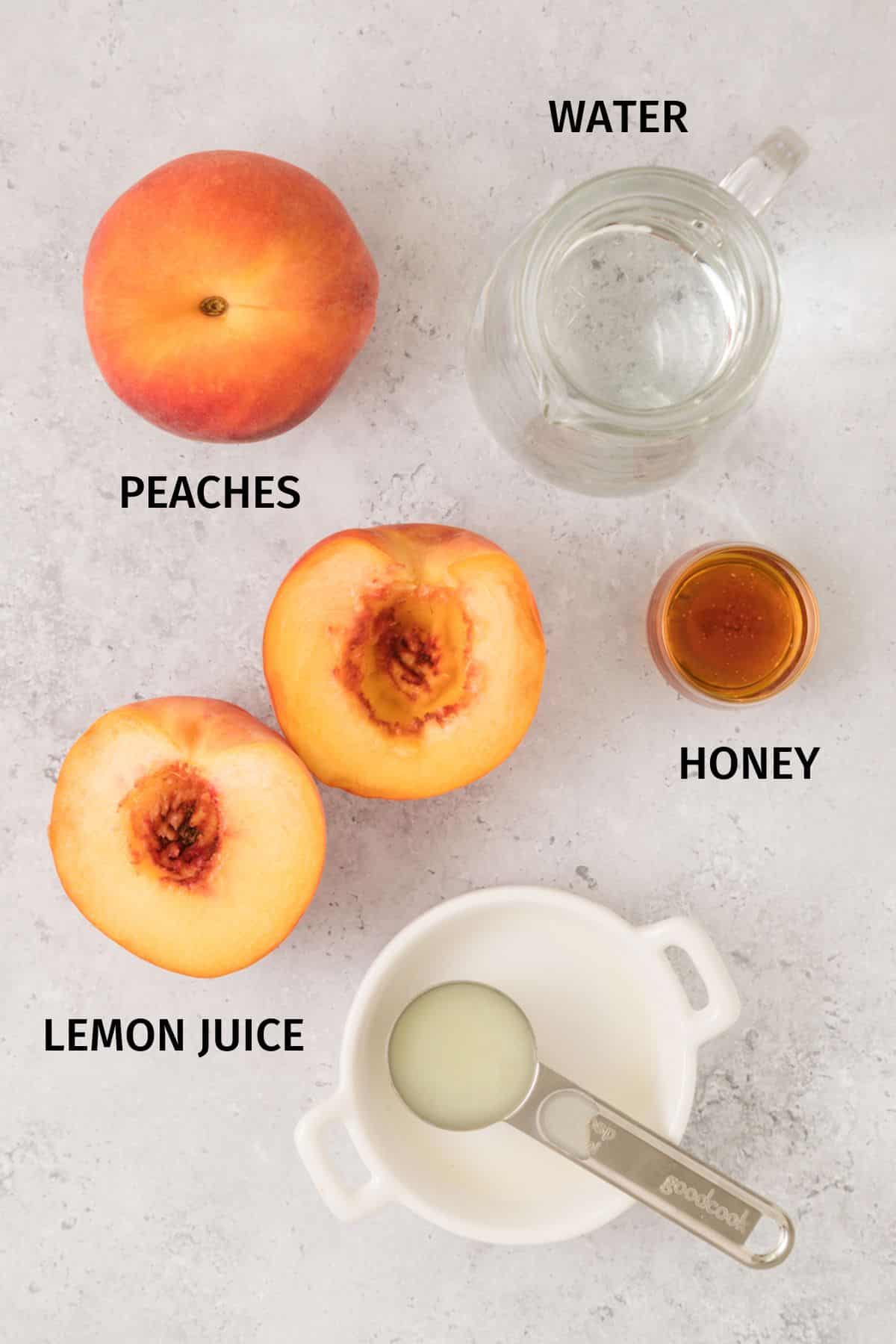 Ingredients to make peach juice on a white surface.