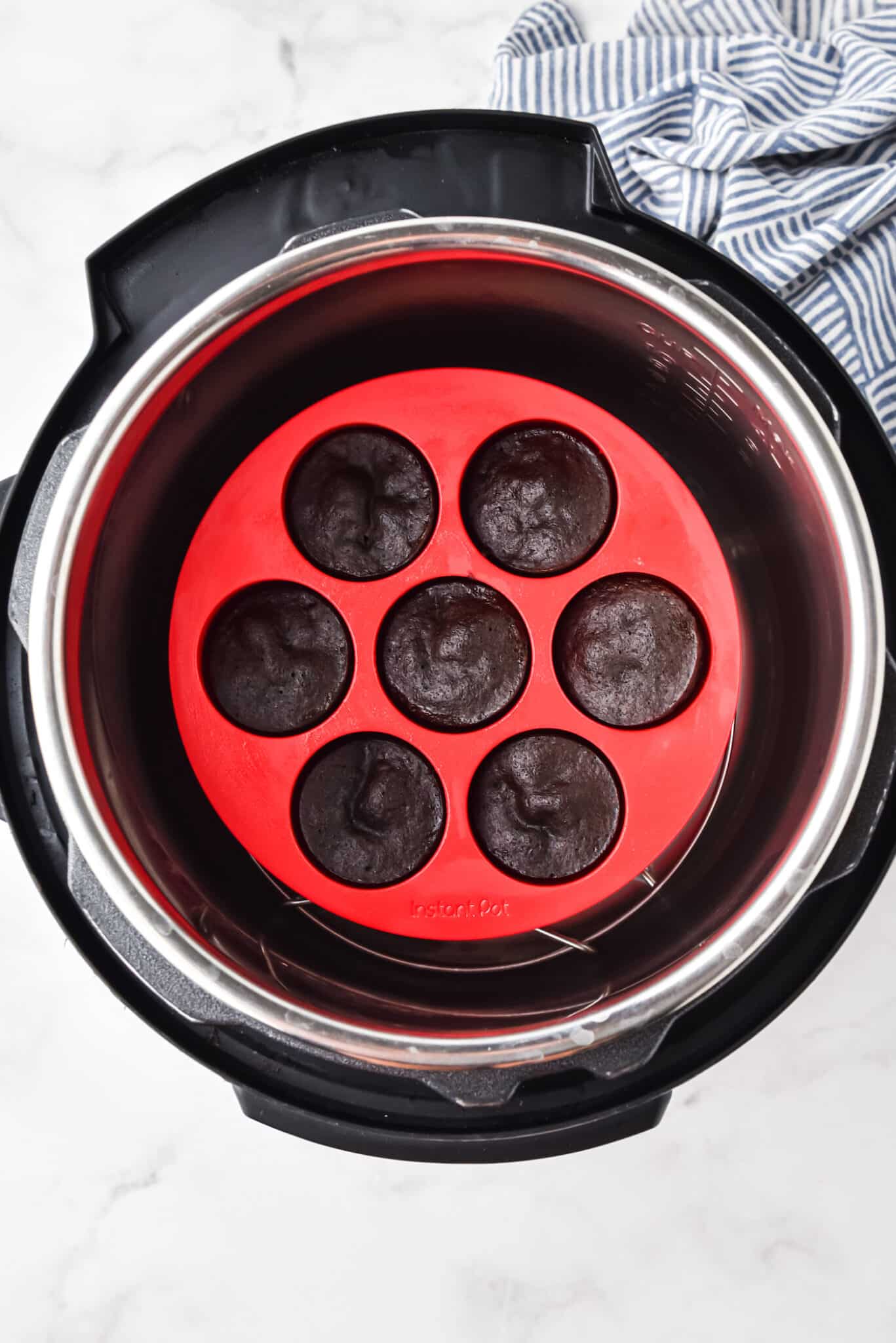 Brownie bites in a silicone mold in an Instant Pot.