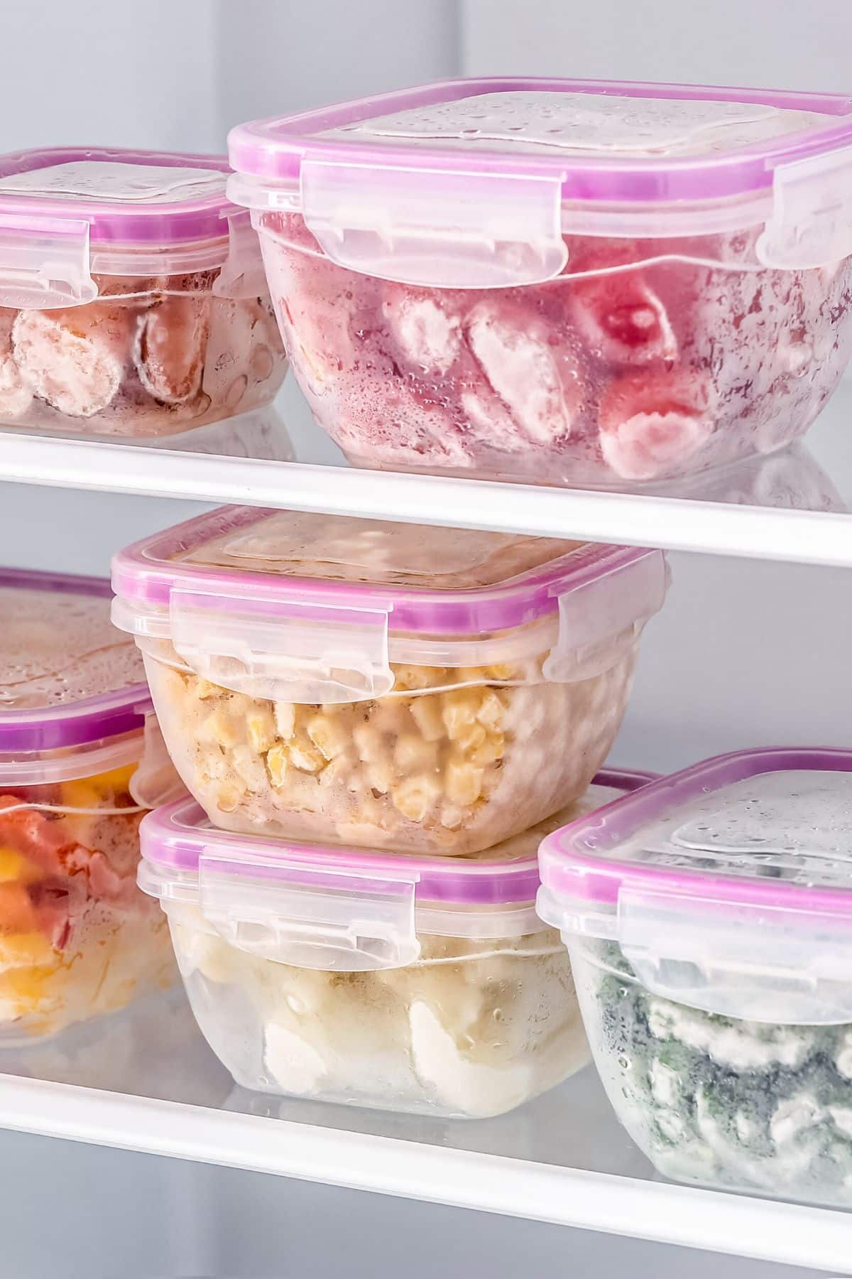 Small glass containers of frozen produce.