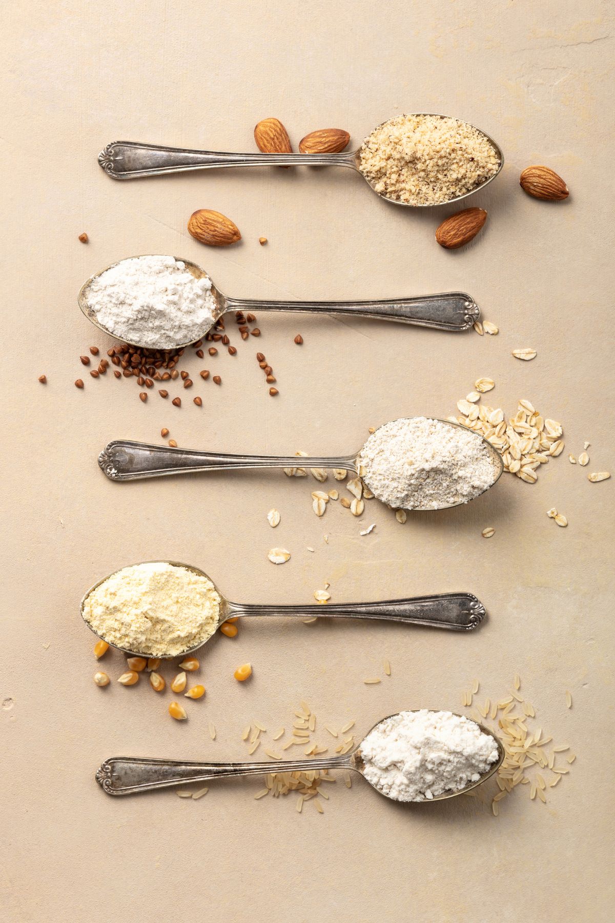 Spoons with different types of gluten free flours.