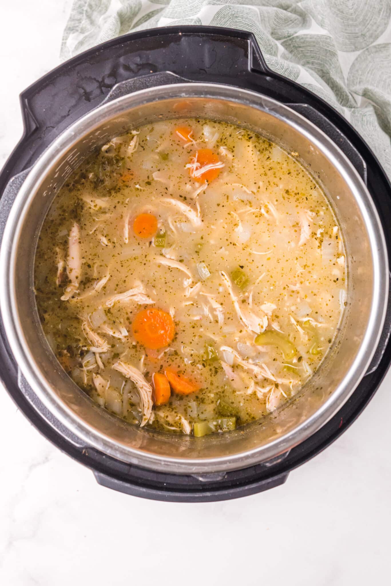Turkey vegetable soup in the insert of an Instant Pot.