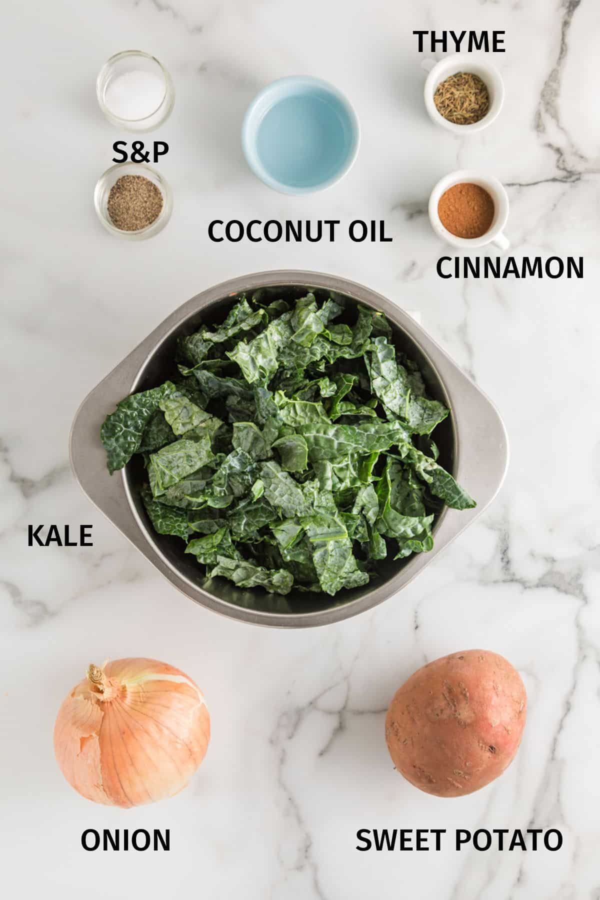 Ingredients for baked kale and sweet potato in small bowls.