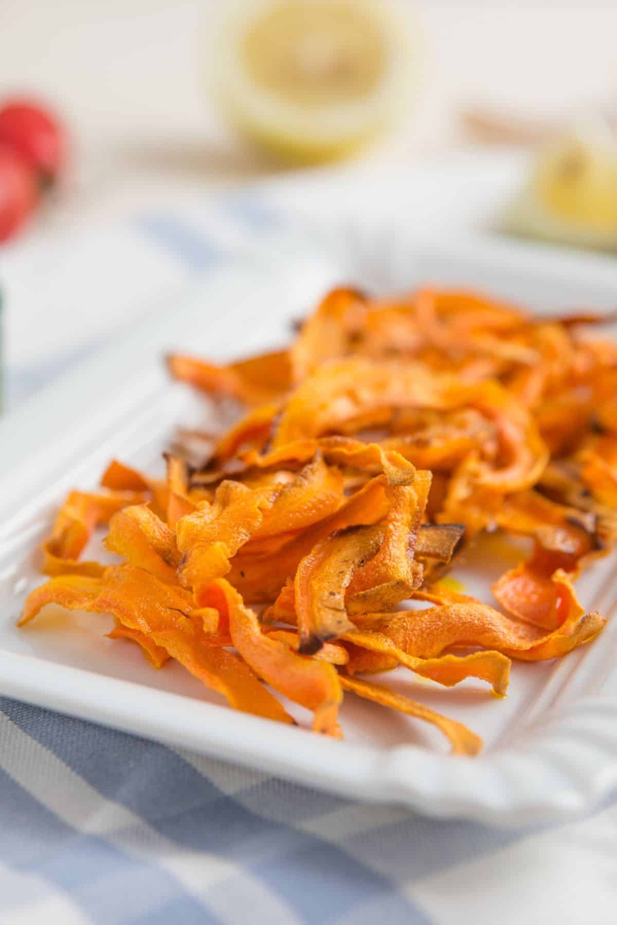 dehydrated carrot strips on plate.