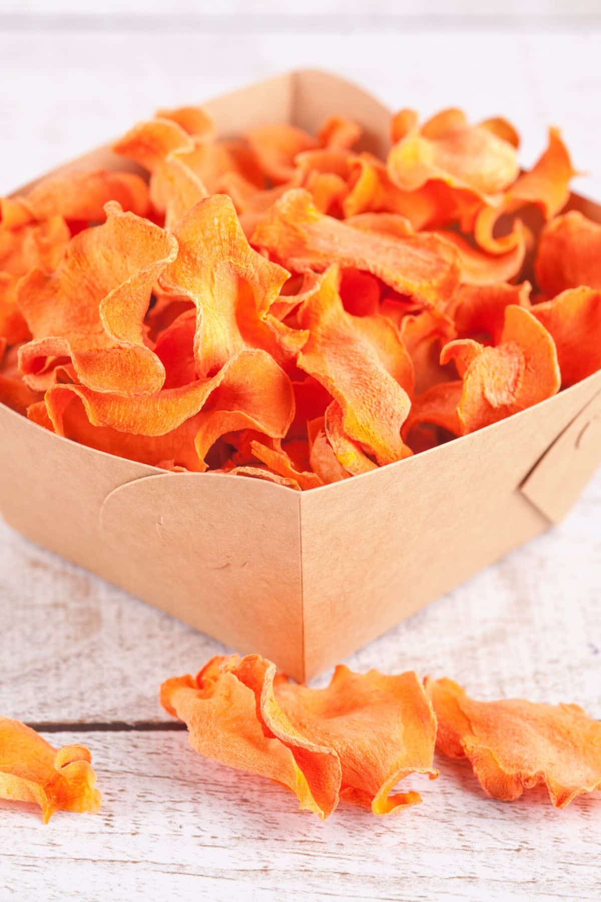 dehydrated carrots in cardboard box.