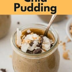 Small jars of PB chia pudding topped with chocolate and coconut.