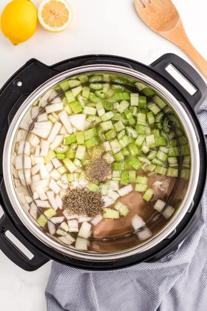 veggies in pot for chicken rice soup.