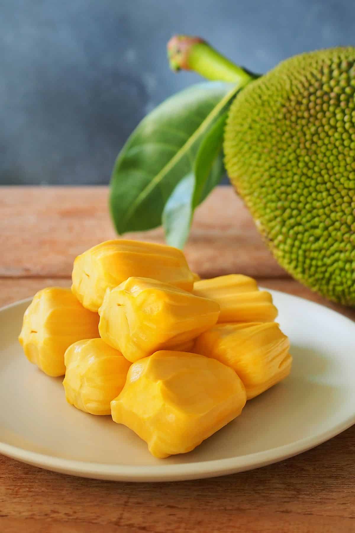 a white plate full of jackfruit.