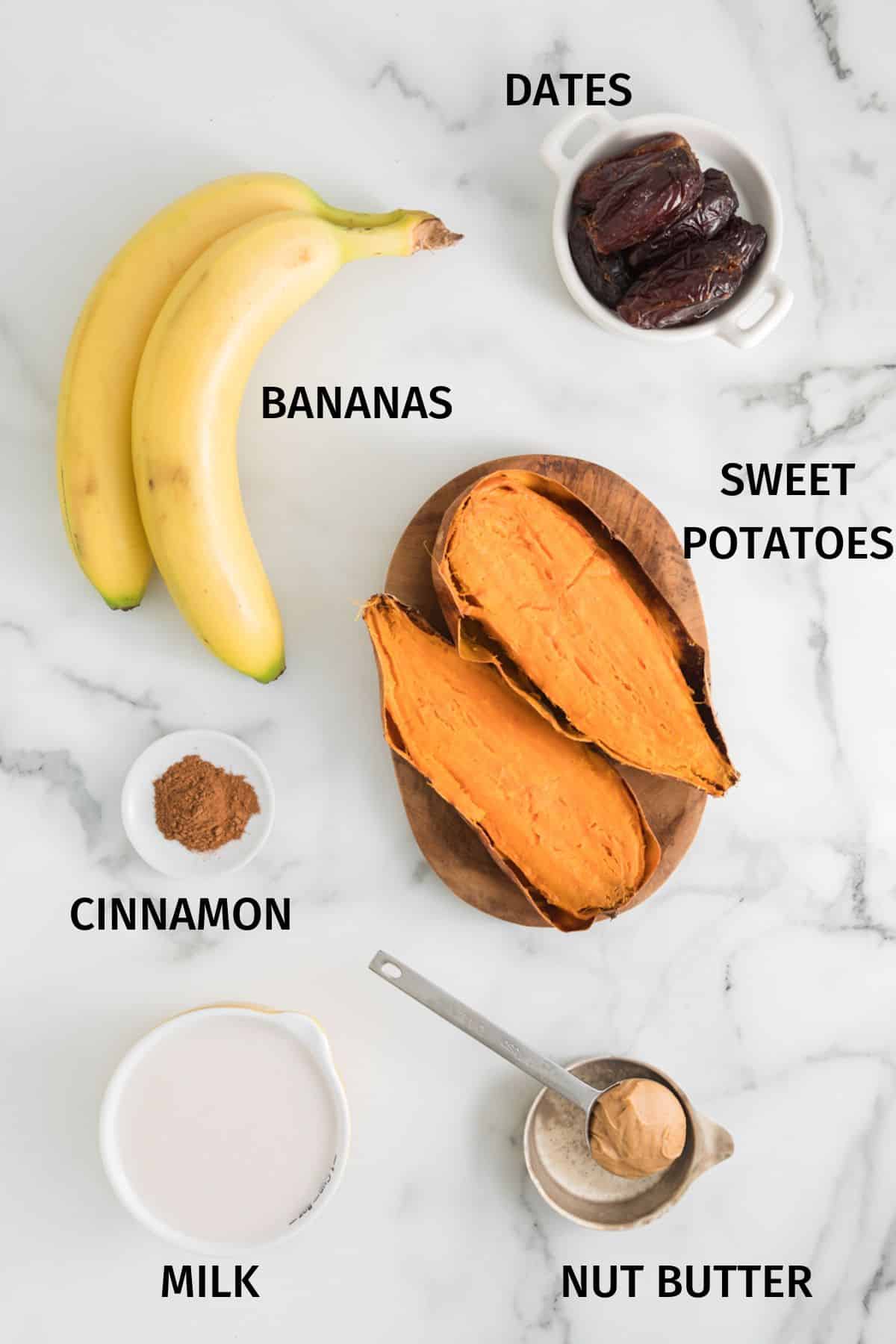 Ingredients for a sweet potato smoothie in small bowls on a white surface.