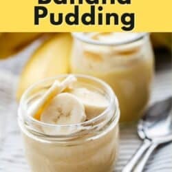 Dairy-free banana pudding in small jars on a striped towel.