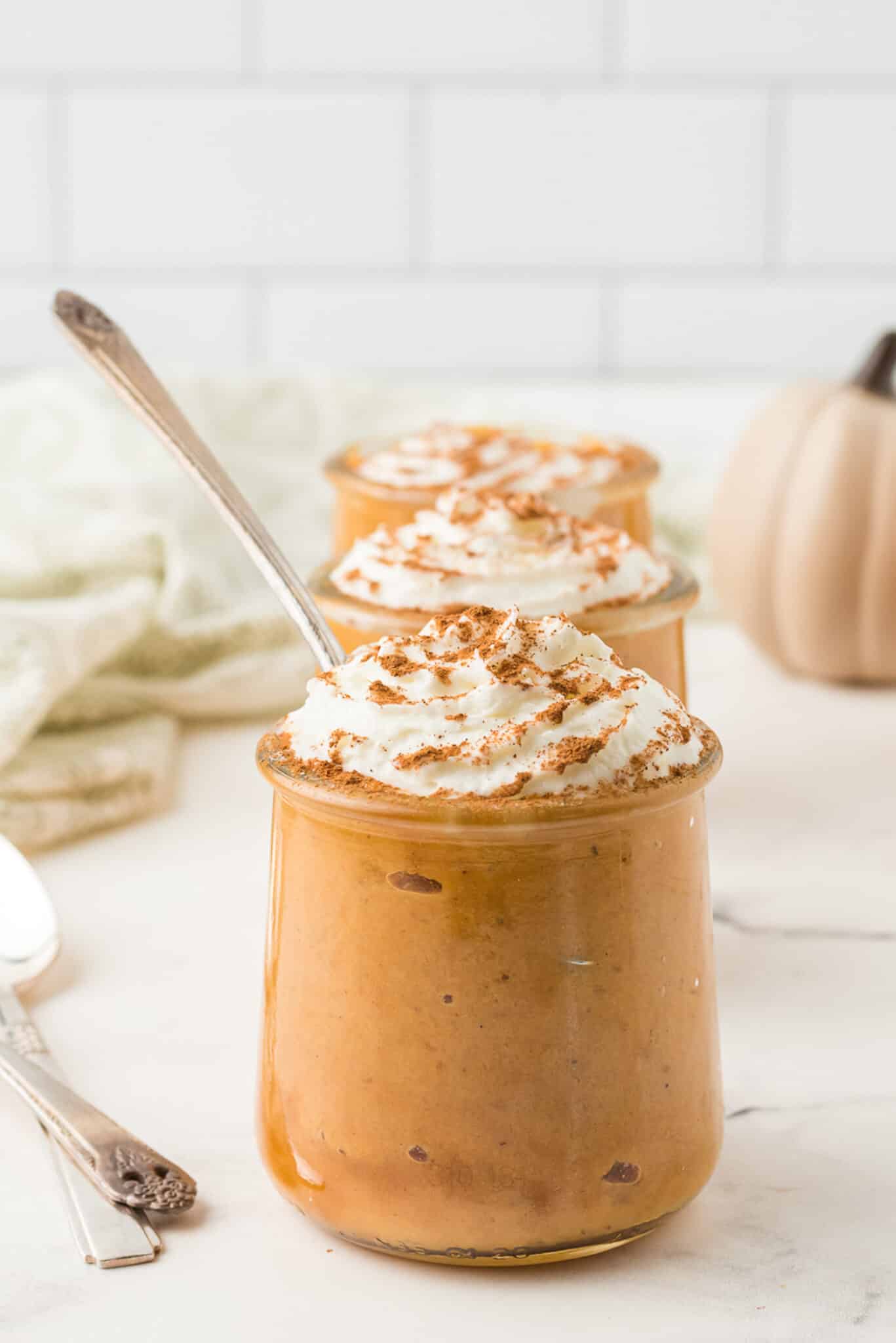 instant pot pumpkin pudding with topping.