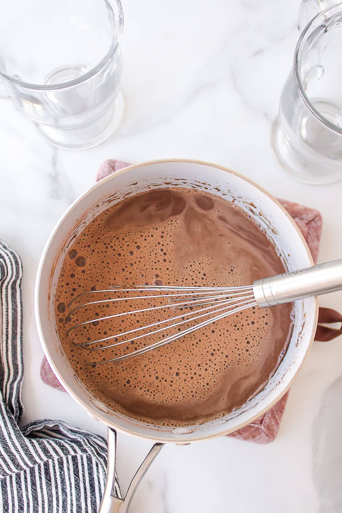 whisking in cocoa powder.
