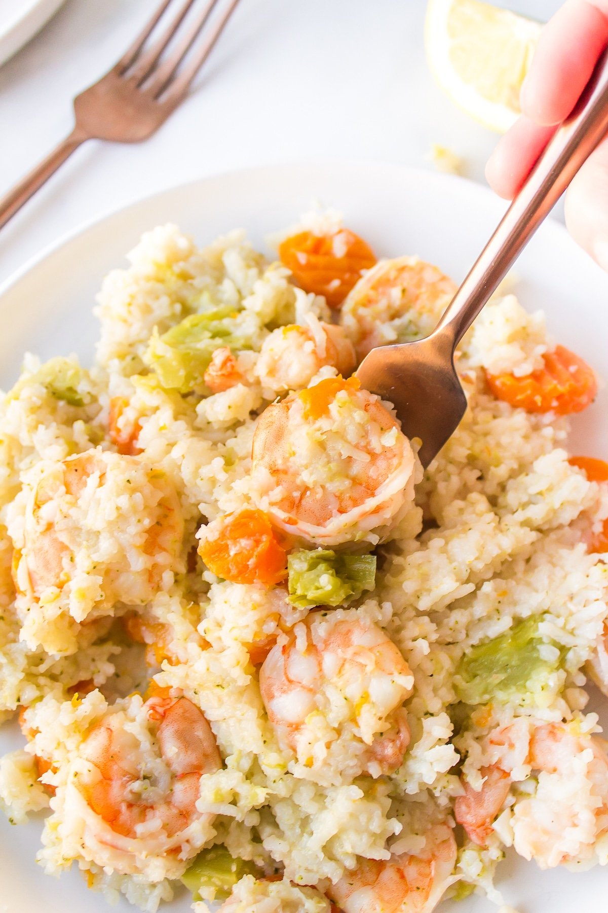 Instant Pot Rice and Shrimp on a white dinner plate.
