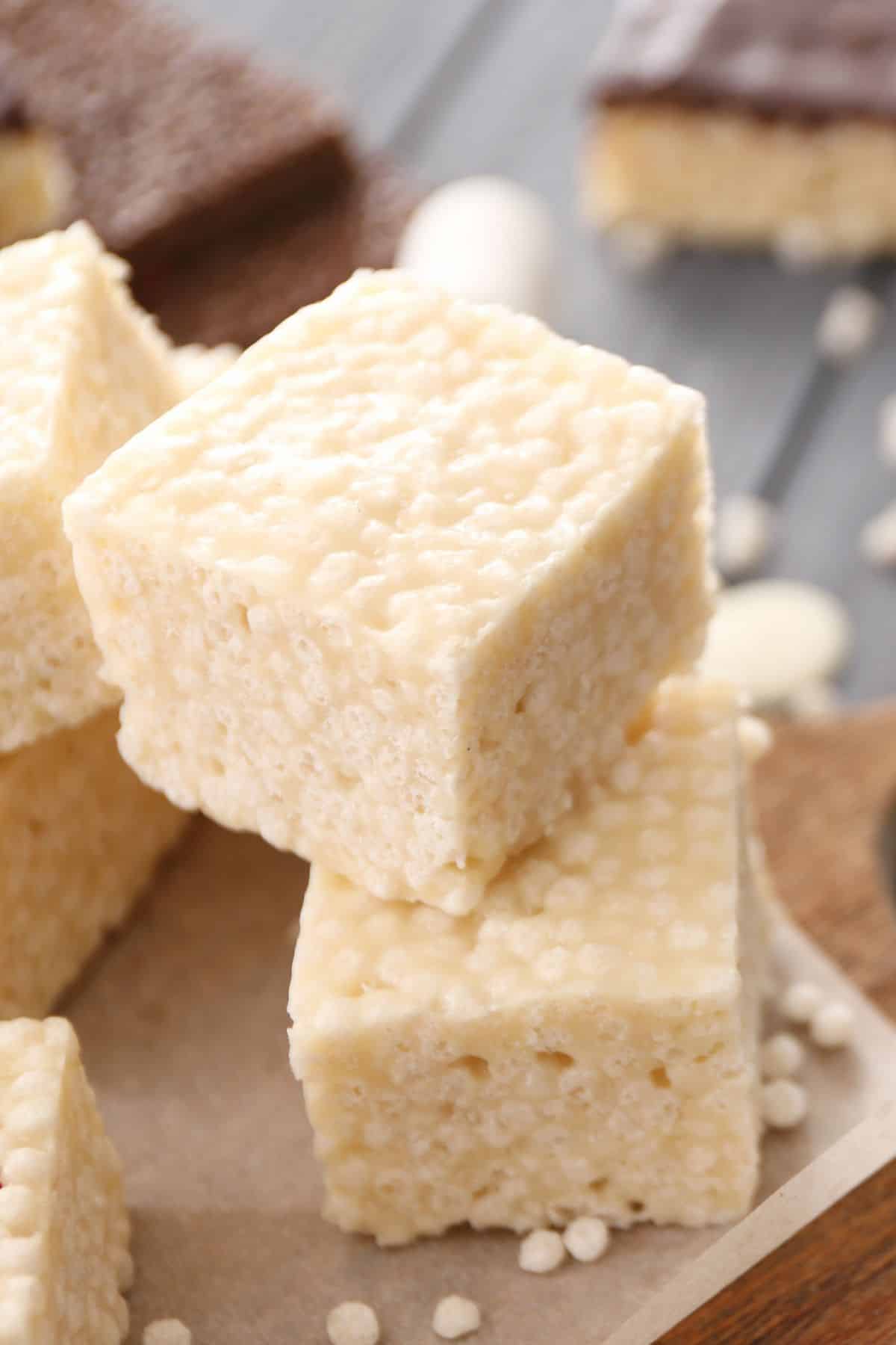 homemade rice krispie treats on a cutting board.