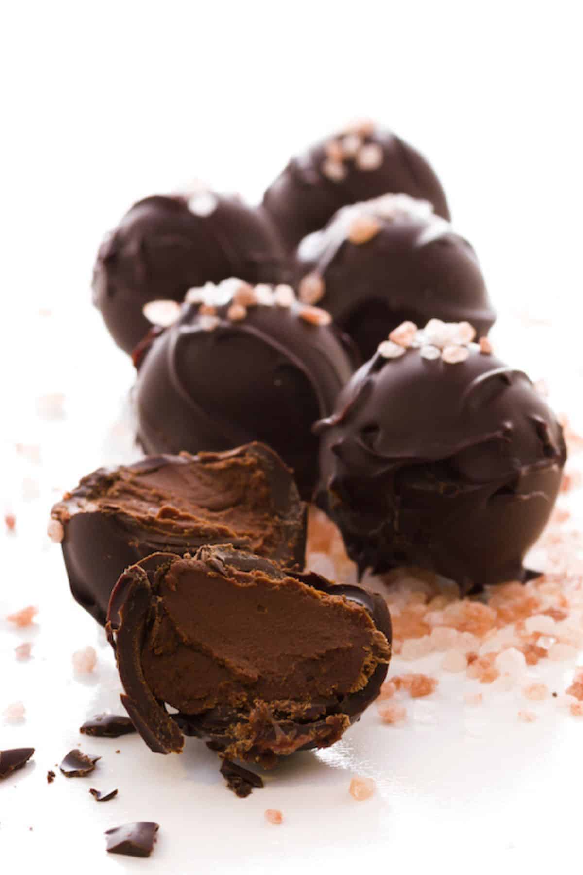 chocolate tahini truffles with sea salt on top.