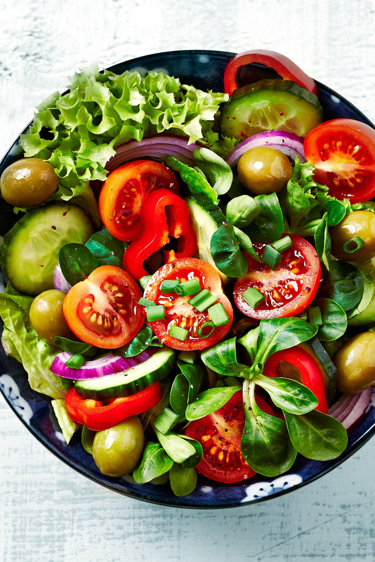 salad with fresh vegetables in bowl.