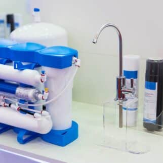 a reverse osmosis water filtration system on a counter.