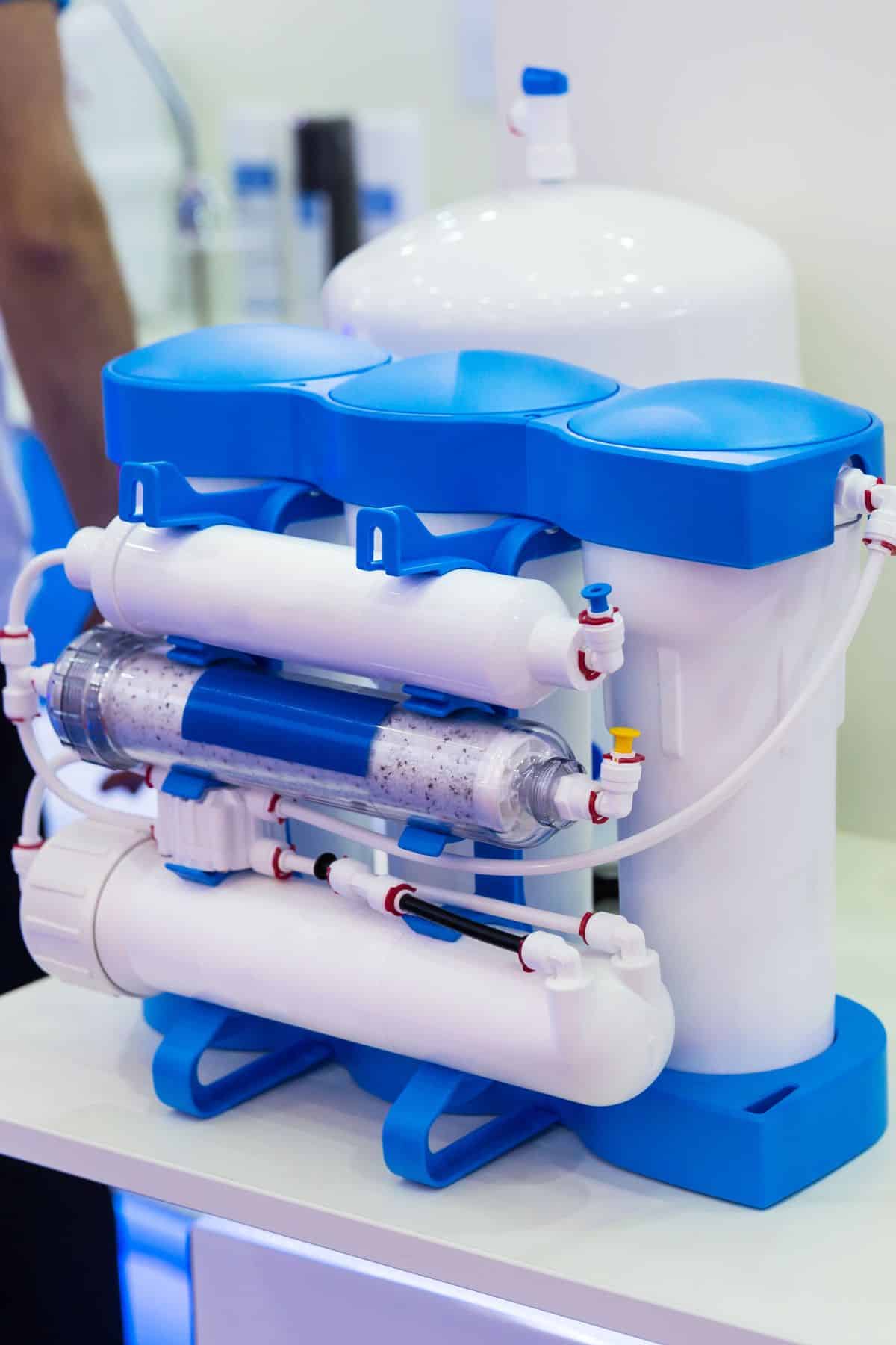 a reverse osmosis water filtration system on a counter.