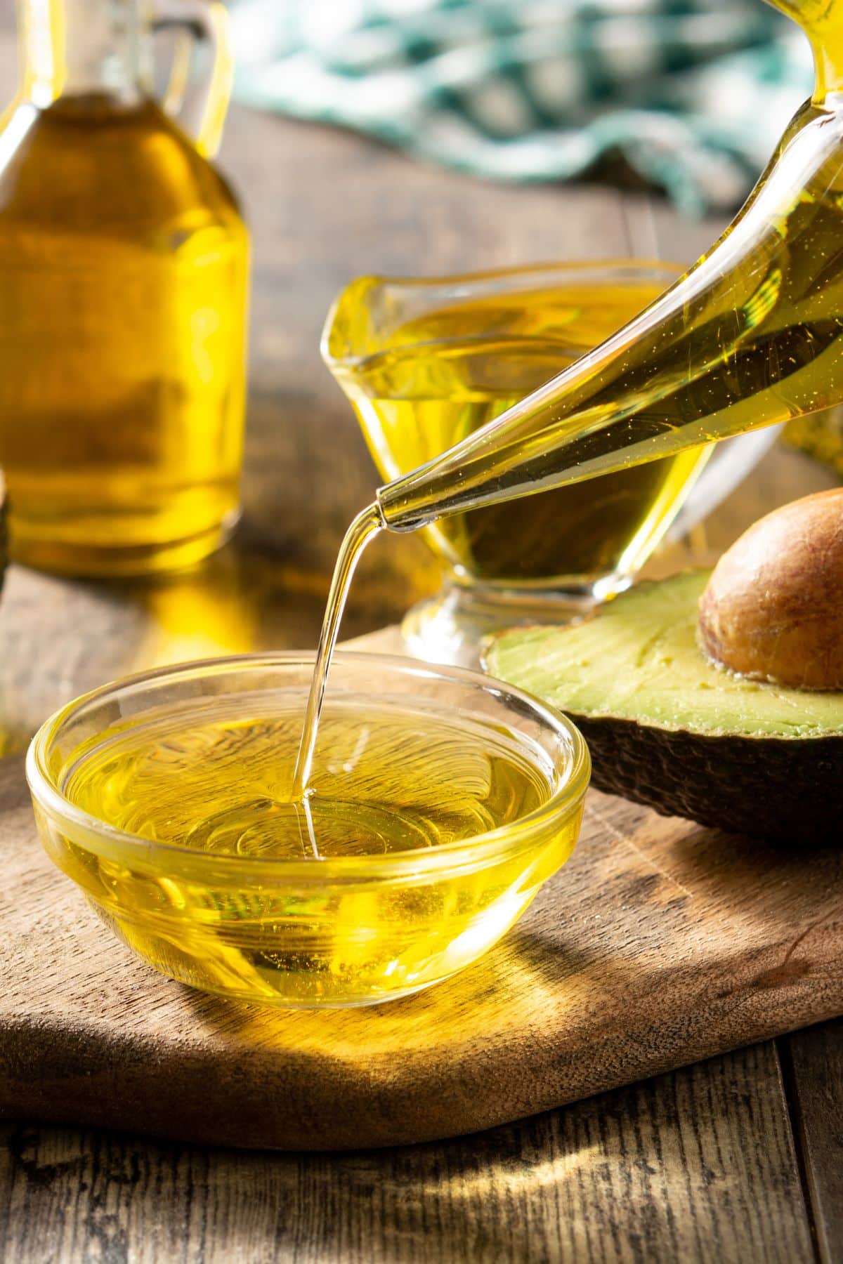 avocado oil being poured into a bowl.