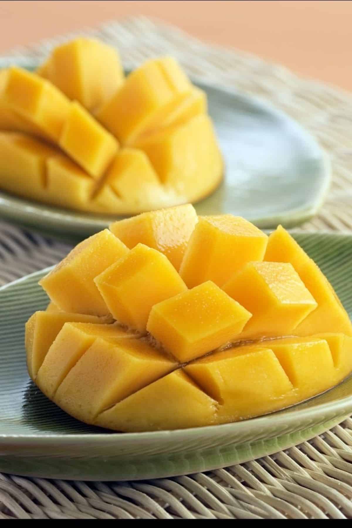 ripe mango served on plate.