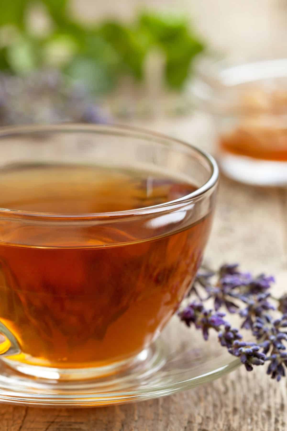 lavendar tea in a clear mug.