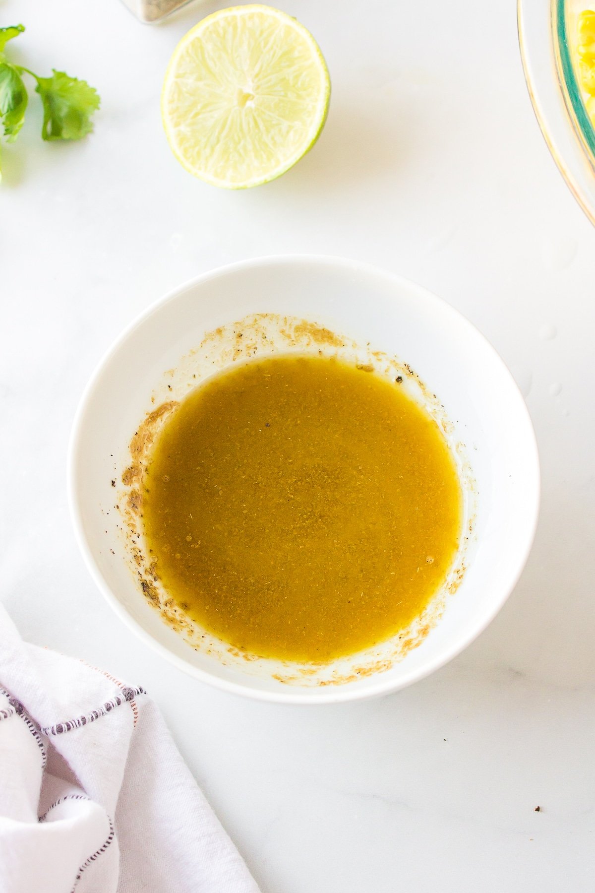 dressing ingredients mixed together in a small bowl.