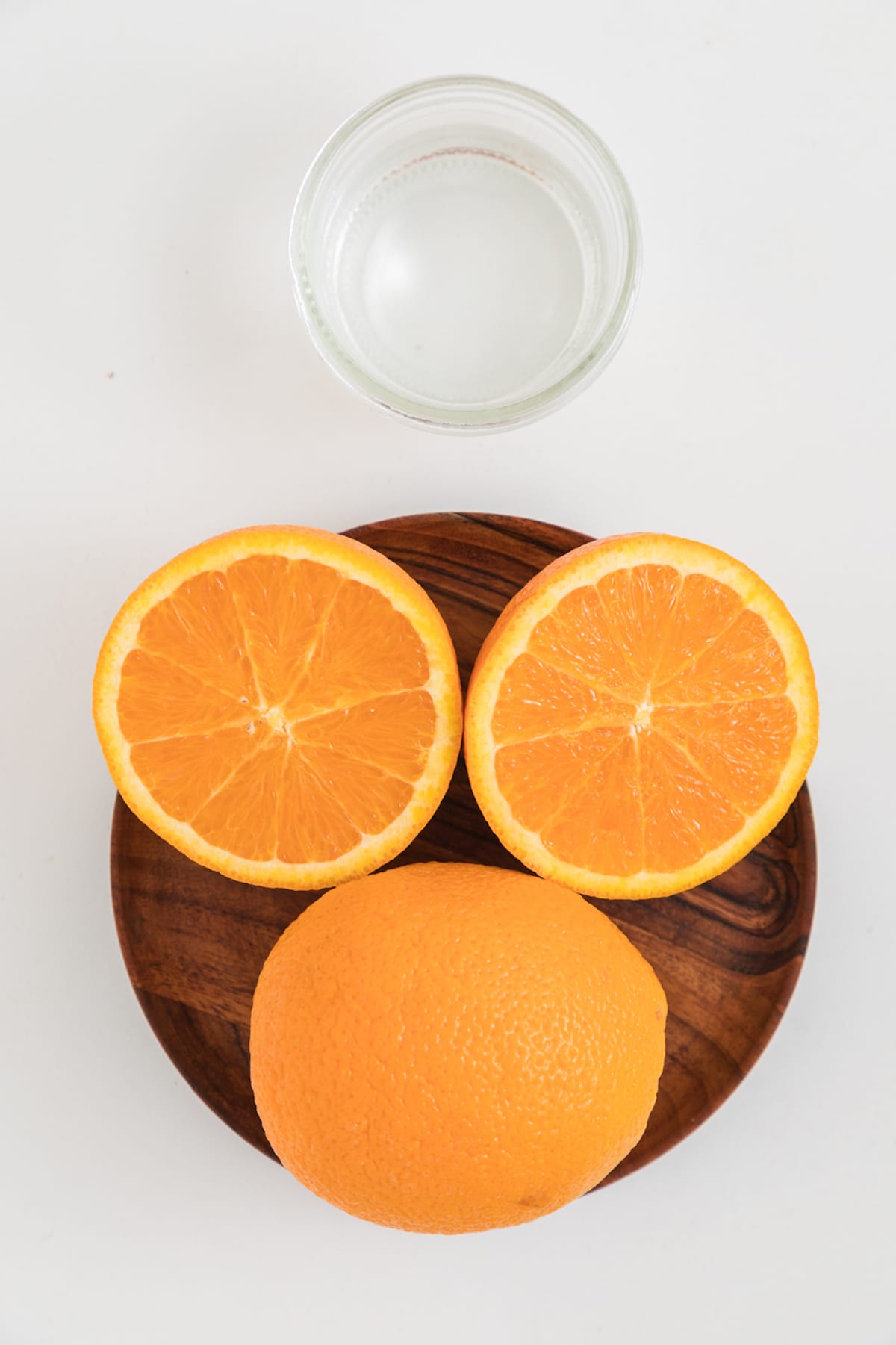 ingredients for making whole blended orange juice.