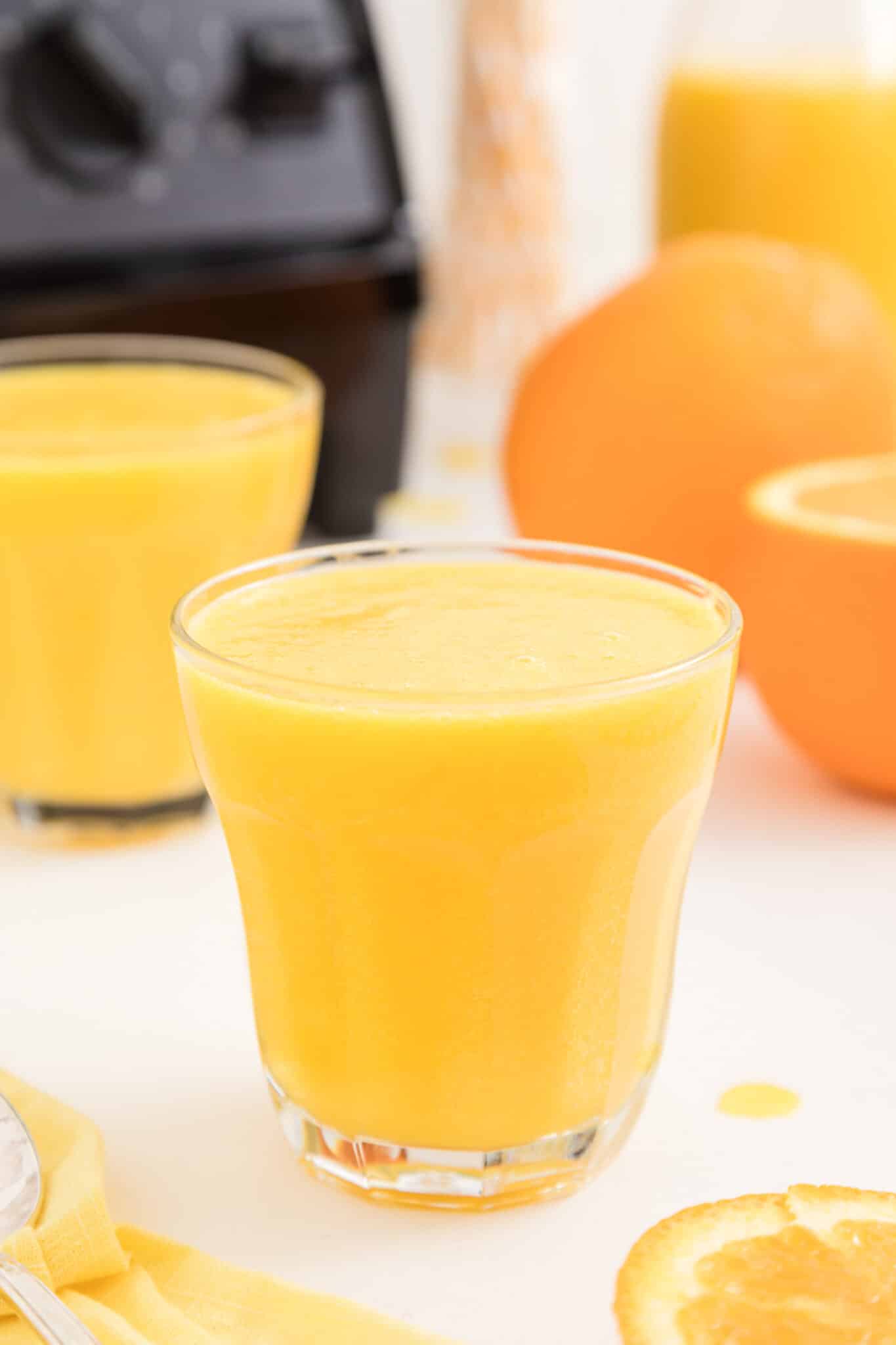 vitamix blended orange juice served in glass.