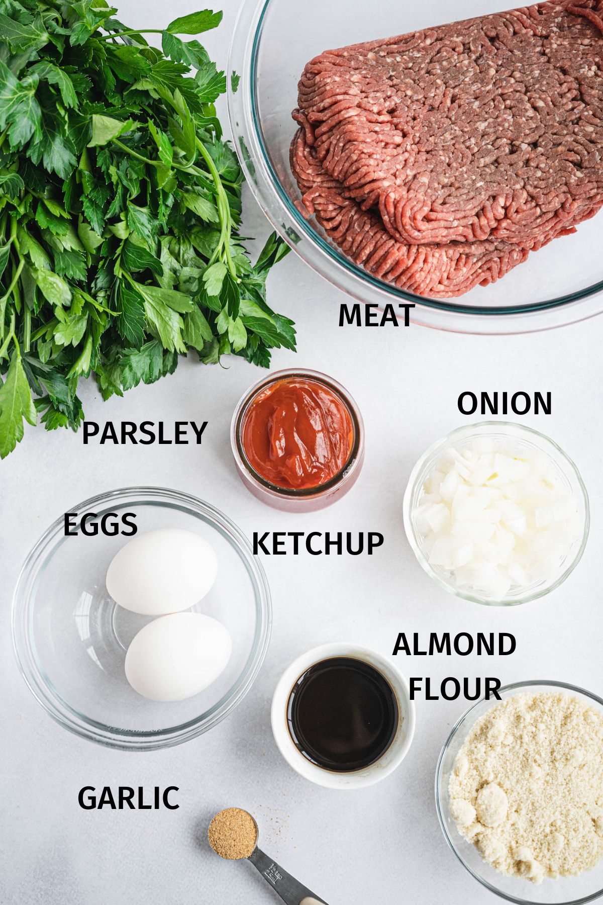 photo with labeled ingredients for gluten free meatloaf with almond flour.