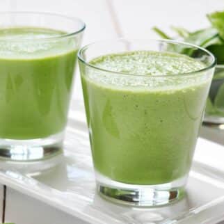 two glasses flat belly spinach smoothie.