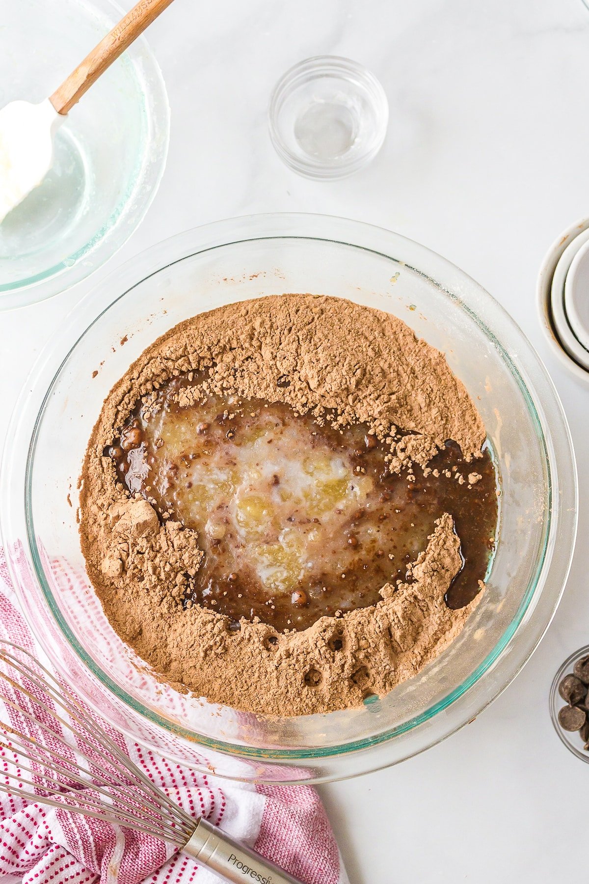 bowl with wet and dry ingredients for brownies.