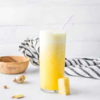 Pineapple Ginger Juice in tall glass.