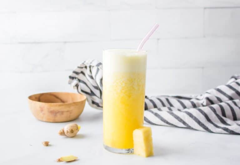 Pineapple Ginger Juice in tall glass.