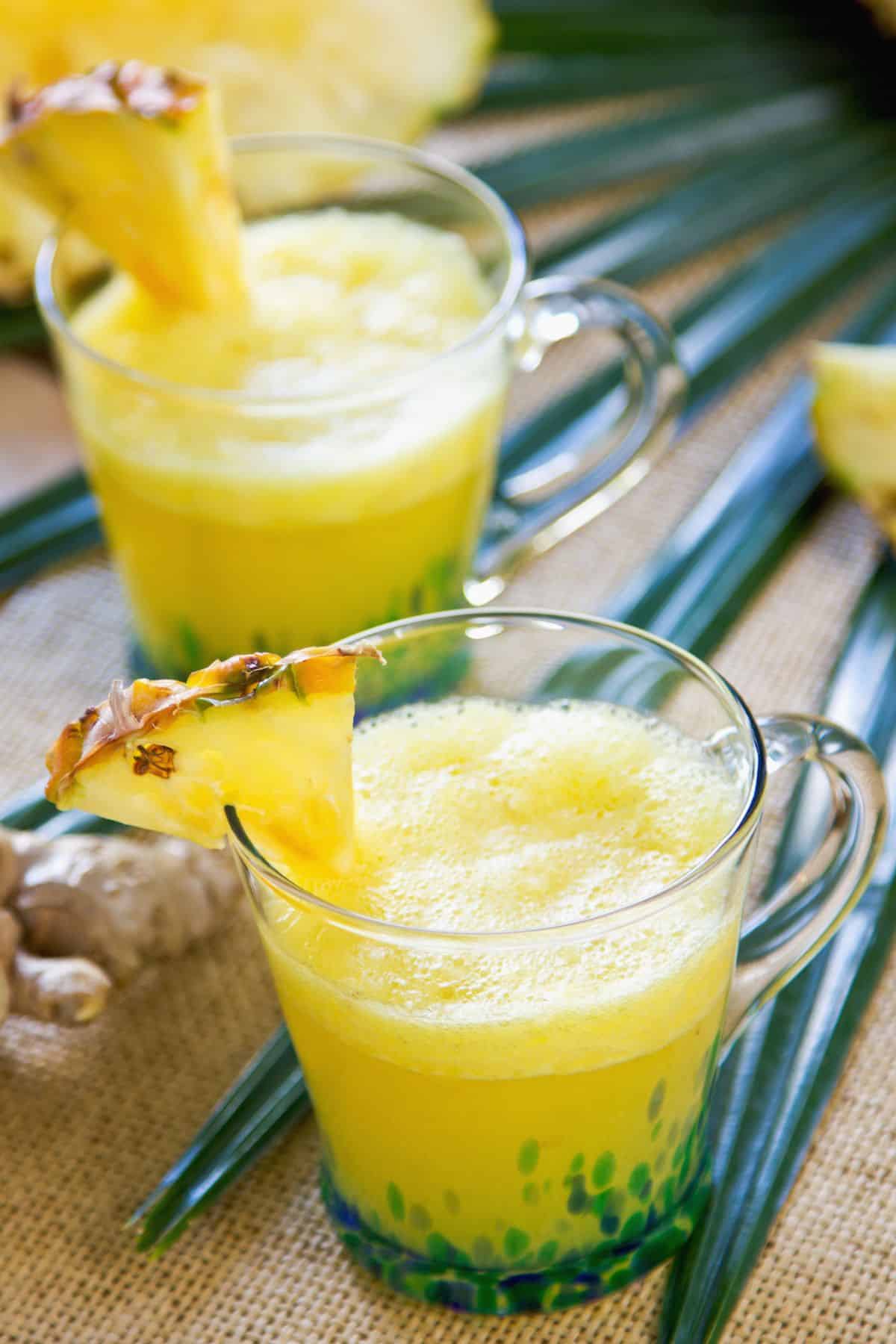 pineapple ginger juice in two glasses.